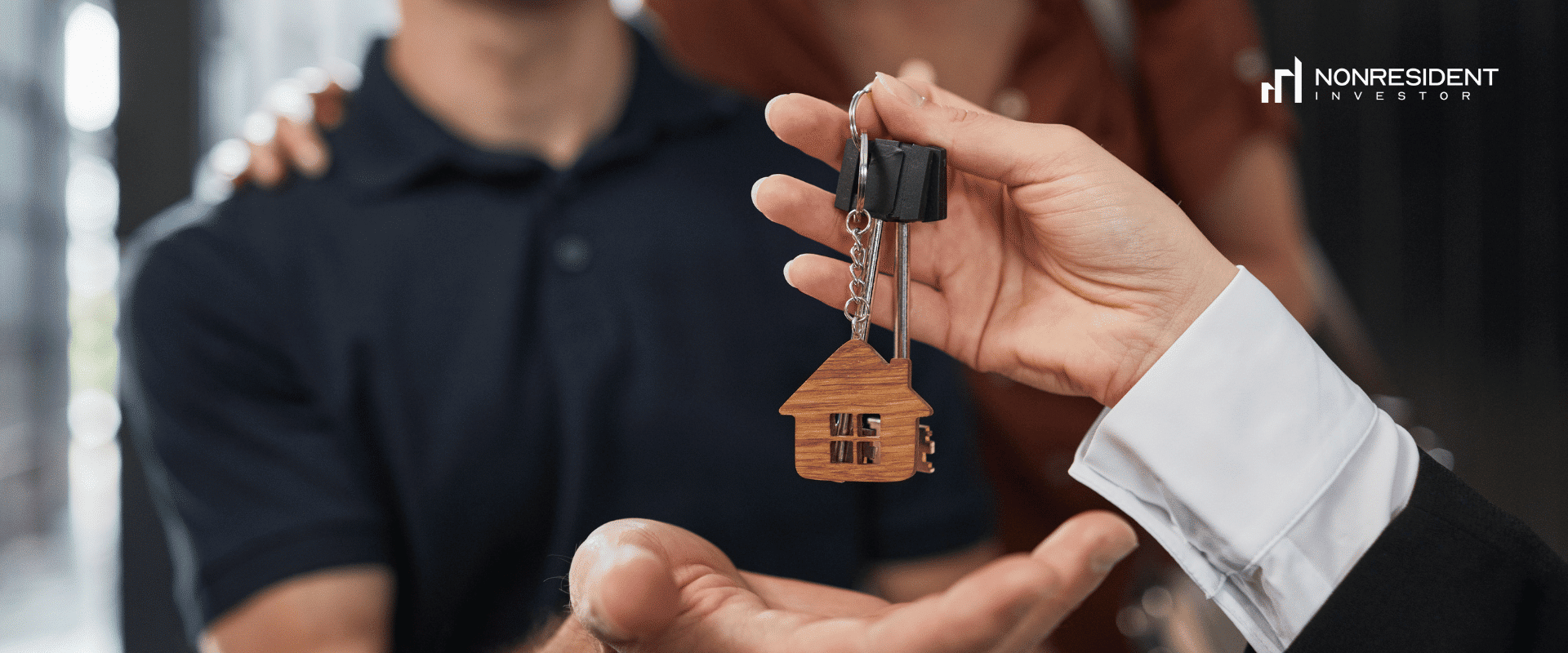a man getting keys to his home in the us